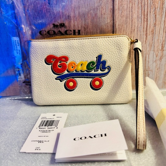 Coach Handbags - Coach Wristlet - 2021 Rainbow Skate, White Pebbled Leather - NWT retails $80